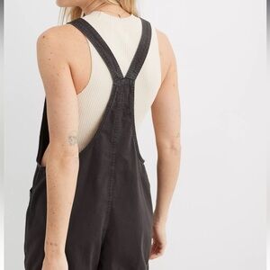 Short black denim overalls